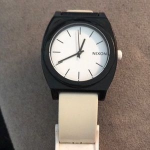 Nixon white and black plastic strap watch